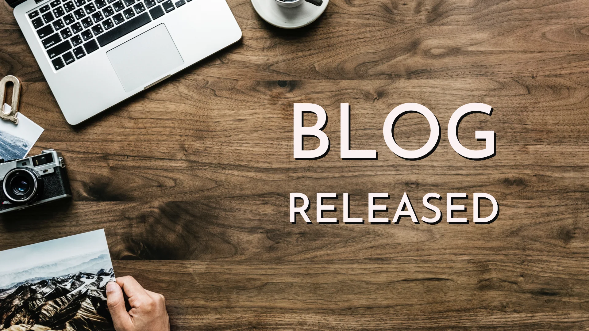 Image showing big Title: "BLOG released" on a desk background